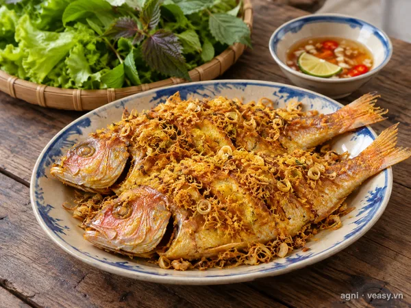 Cá hường rán sả nghệ (ảnh minh hoạ do AI tạo)