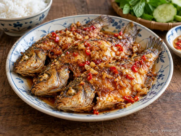 Cá mó rán mắm tỏi (ảnh minh hoạ do AI tạo)