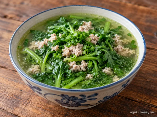 Canh cải cúc nấu thịt băm (ảnh minh hoạ do AI tạo)
