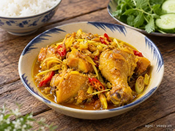 Gà kho nghệ (ảnh minh hoạ do AI tạo)