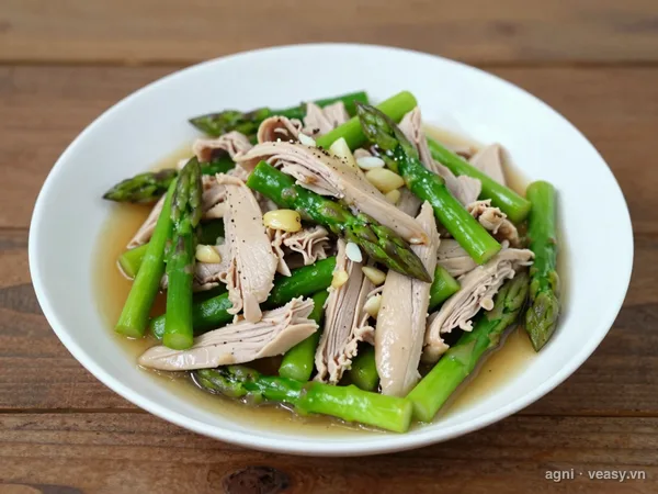Gà xào măng tây (ảnh minh hoạ do AI tạo)