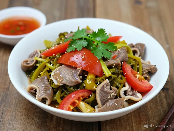Lòng lợn xào dưa chua (ảnh minh hoạ do AI tạo)