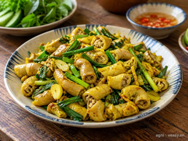 Lòng lợn xào nghệ (ảnh minh hoạ do AI tạo)