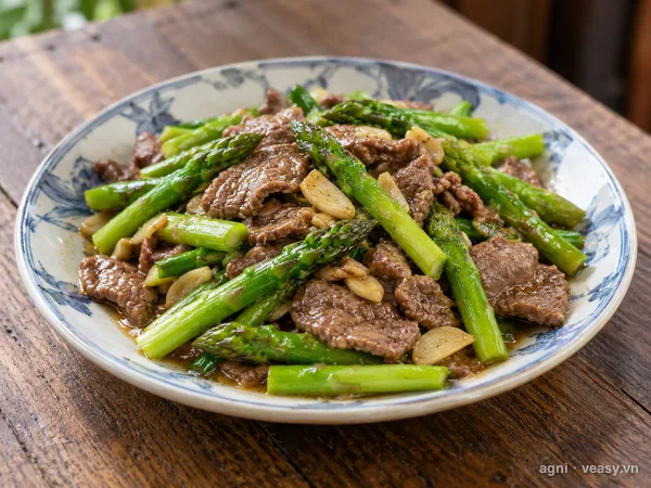 Măng tây xào thịt bò (ảnh minh hoạ do AI tạo)