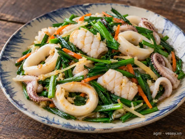 Mực xào hẹ (ảnh minh hoạ do AI tạo)