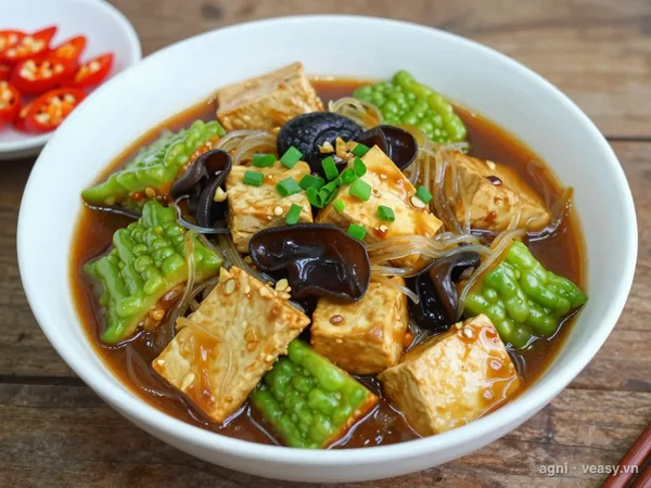 Mướp đắng kho chay (ảnh minh hoạ do AI tạo)
