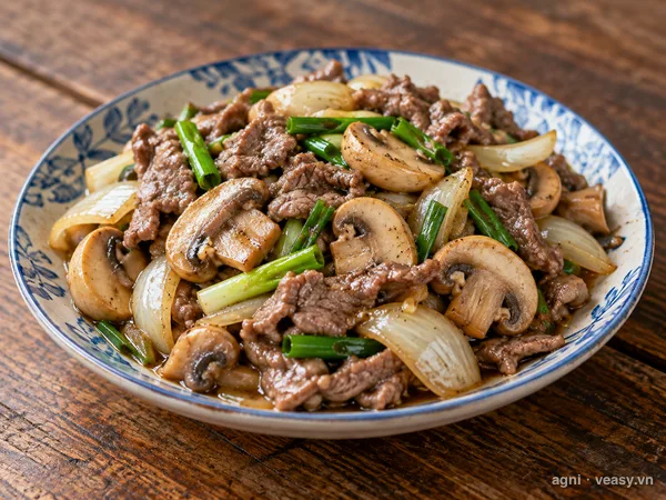 Thịt bò xào nấm mỡ (ảnh minh hoạ do AI tạo)