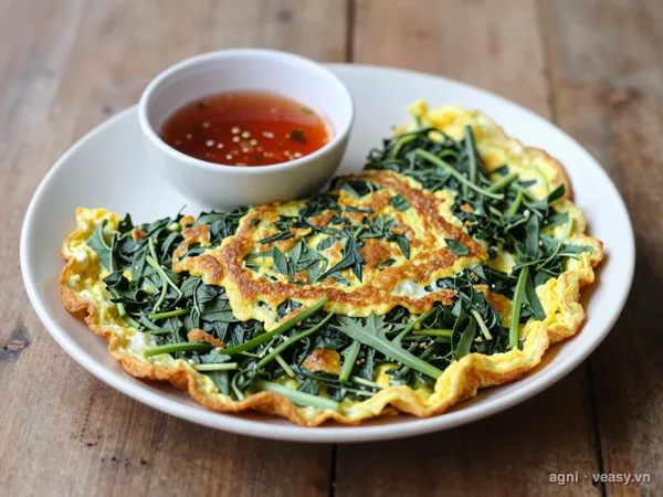 Trứng rán ngải cứu (ảnh minh hoạ do AI tạo)