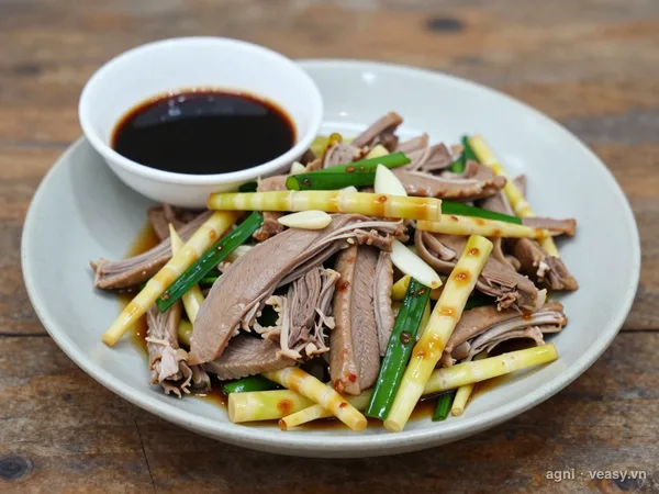 Vịt xào măng (ảnh minh hoạ do AI tạo)